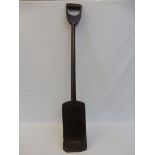 A 19th Century beech peat shovel with old iron repairs, 43 3/4" long.