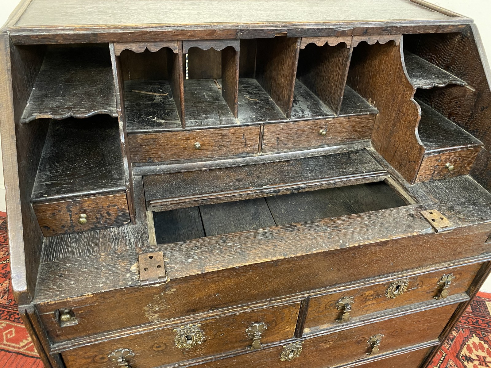 An 18th Century oak bureau of small proportions with stepped interior and bible well, 27" wide. - Image 4 of 9
