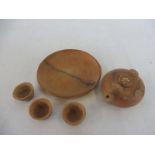 A miniature Chinese terracotta tea set, signature to saucer.