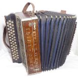 An early 20th century three row button Accordion Ranco Luigi. Nicely preserved collector item. Minor