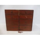 A mahogany bank of eight drawers.