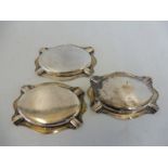 Three matching oval silver Aspreys ashtrays, Chester 1926.