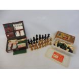 A boxwood chess set, one other and a games compendium.