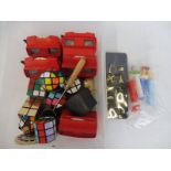 A collection of original rubiks cubes, various view finders etc.