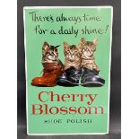 A Cherry Blossom Shoe Polish pictorial tin advertising sign, depicting three kittens sat in boots,