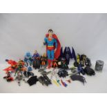 A crate of action figures to include Batman and Superman.