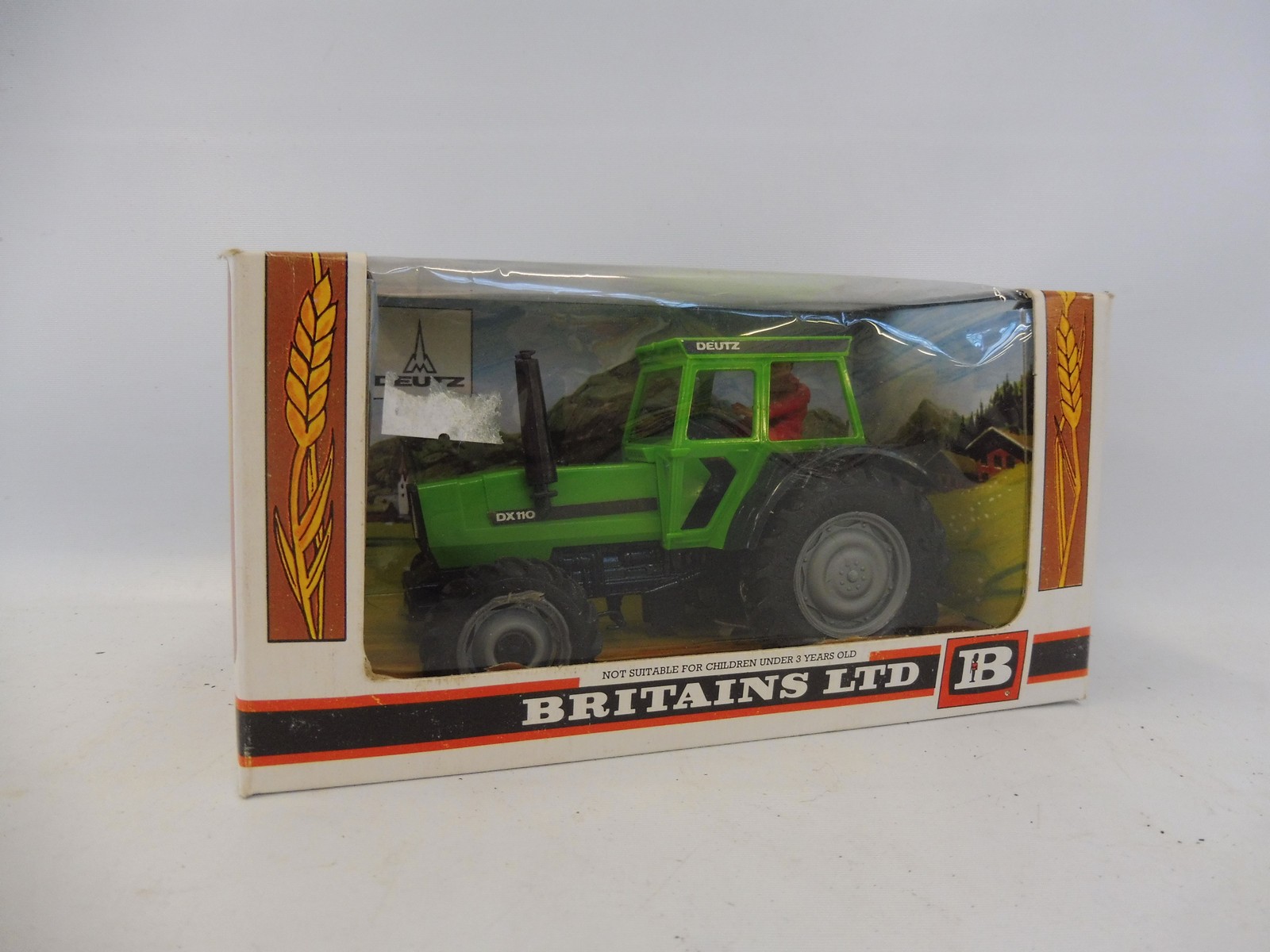 A boxed Britains Deutz Heavy Tractor model no. 9526, in green livery, good box condition.