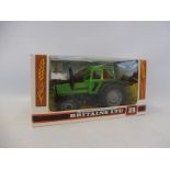 A boxed Britains Deutz Heavy Tractor model no. 9526, in green livery, good box condition.