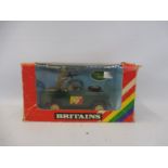 A boxed Britains Military Land Rover with figures, circa 1980, average box condition.