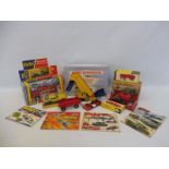 Six boxed Dinky Toys including an early Blaw Knox bulldozer plus four catalogues.