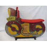 A fairground motorbike, wooden composition from an ark ride, reconditioned saddle.