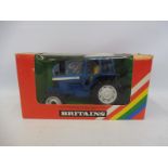 A boxed Britains no. 9523 Ford Tractor, box condition good, model appears excellent, circa 1980.