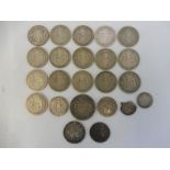 Seventeen silver half crowns, mostly circa 1920, the oldest being 1890, the newest 1926, two Florins