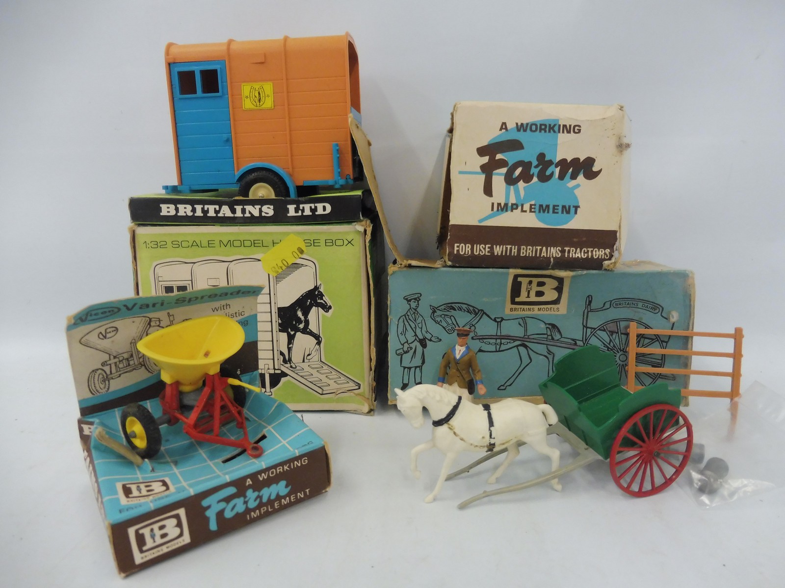 Three boxed Britains no. 9503 Milk Float, a 9547 and a 9538.