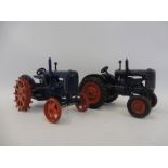 Two early Crescent die-cast tractors.