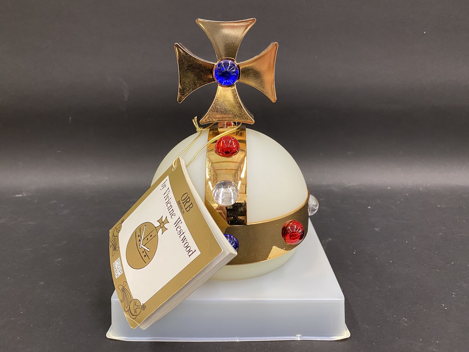 A Pop Swatch Vivienne Westwood ORB PWZ 104 (1993), sold with booklet and spherical orb box decorated