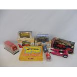 A selection of boxed commercial vehicles and a Kenner Super Sprinter Racer.