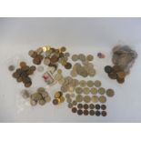 A collection of mostly British coinage including 50 pence pieces, some old pennies etc.