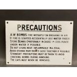 A 'Precautions' A.W. Bombs... rectangular enamel sign in excellent condition, 12 x 8".