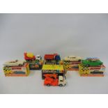 Three boxed Tomica die-cast models and three Lone Star boxed die-cast flyers including a Jaguar