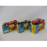 Three boxed Corgi cars: The Vanwall 1505, a Cooper Maserati no. 156 and the Ferrari Berlineta Le