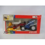 A boxed Britains no. 9617 Ford Tractor and Front Loader, circa 1989.