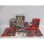 A quantity of Transformers merchandise to include a pinball and other items.