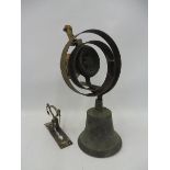 A brass butler's bell plus partial mechanism.