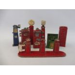 A small quantity of die-cast petrol pumps and others.