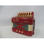 A Hero Midget accordian approx. 1960 with instructions.