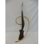 A rare fairground shooting gallery rifle for compressed air, nicely worked stock, for restoration.