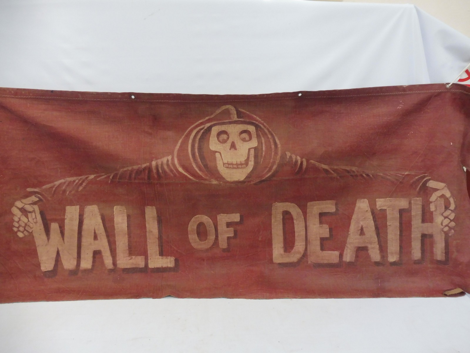 A rare fairground original artwork banner 'Wall of Death' painted on heavy canvas, 78 x 32".