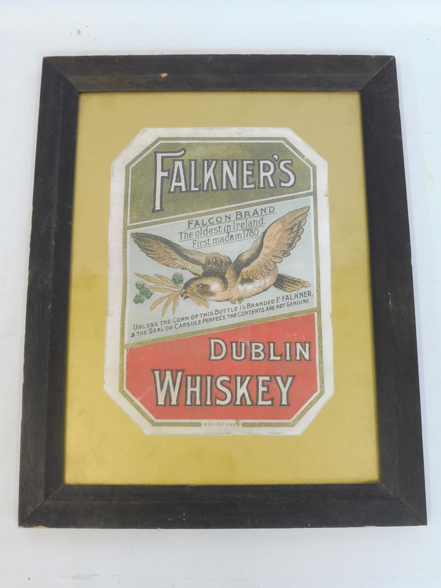 A framed and glazed Falkner's Dublin Whiskey advertisement, 13 x 16 1/2".