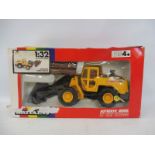 A Britains boxed 9509 Log Master Timber Grapple, condition of box poor, model condition good.