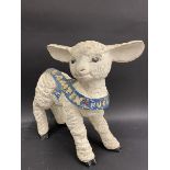 A Lamtex Rugs shop window advertising model of a lamb.