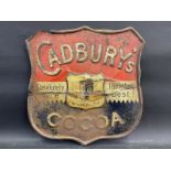 A rare and early Cadbury's Cocoa embossed shield shaped tin advertising sign, 20 1/4 x 20 3/4".