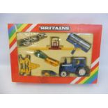 A circa 1980 Britains Rainbow Pack no. 9592 Ford TW40 Tractor and Implements.