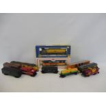 Three USA diesels, two boxed with box cars, cabooses etc.