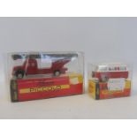 A boxed Schuco Piccolo VW camper and Magirus fire engine.