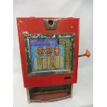 A Duchess penny arcade one armed bandit machine.