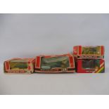 Four boxed Britains farm implements and accessories comprising a 9540 manure spreader, 9534 disc