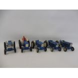 Five period Dinky Ford 6600 tractors.