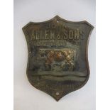 A John Allen & Sons (Oxford) Ltd of Cowley Oxford shield shaped brass plaque, with a Morris style