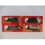 Three boxed Hornby tank locomotives, and a dockyard diesel shunter.