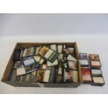 A large box of Magic Gathering play cards, in generally good condition.