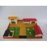 A playset farm, circa 1970s comprising buildings and animals.