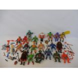 A quantity of original He-Man figures and accessories.