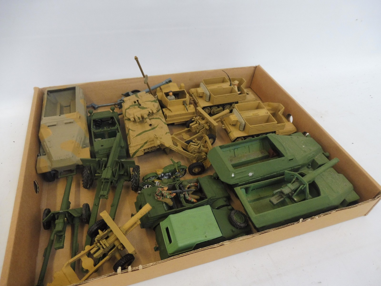 A tray of assorted Dinky Britains diecast, mainly overpainted to include German, field artillery and