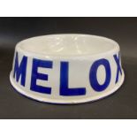 A Melox enamel dog food bowl.