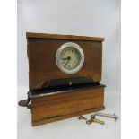 A National Time Recorder Co. Ltd clocking in and clocking out machine of small size with keys, by